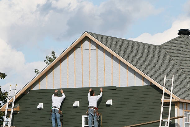 Professional Emergency Siding Repair technician working in Roxbury Crossing, MA